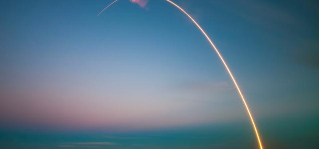 ray of light near body of water by SpaceX courtesy of Unsplash.